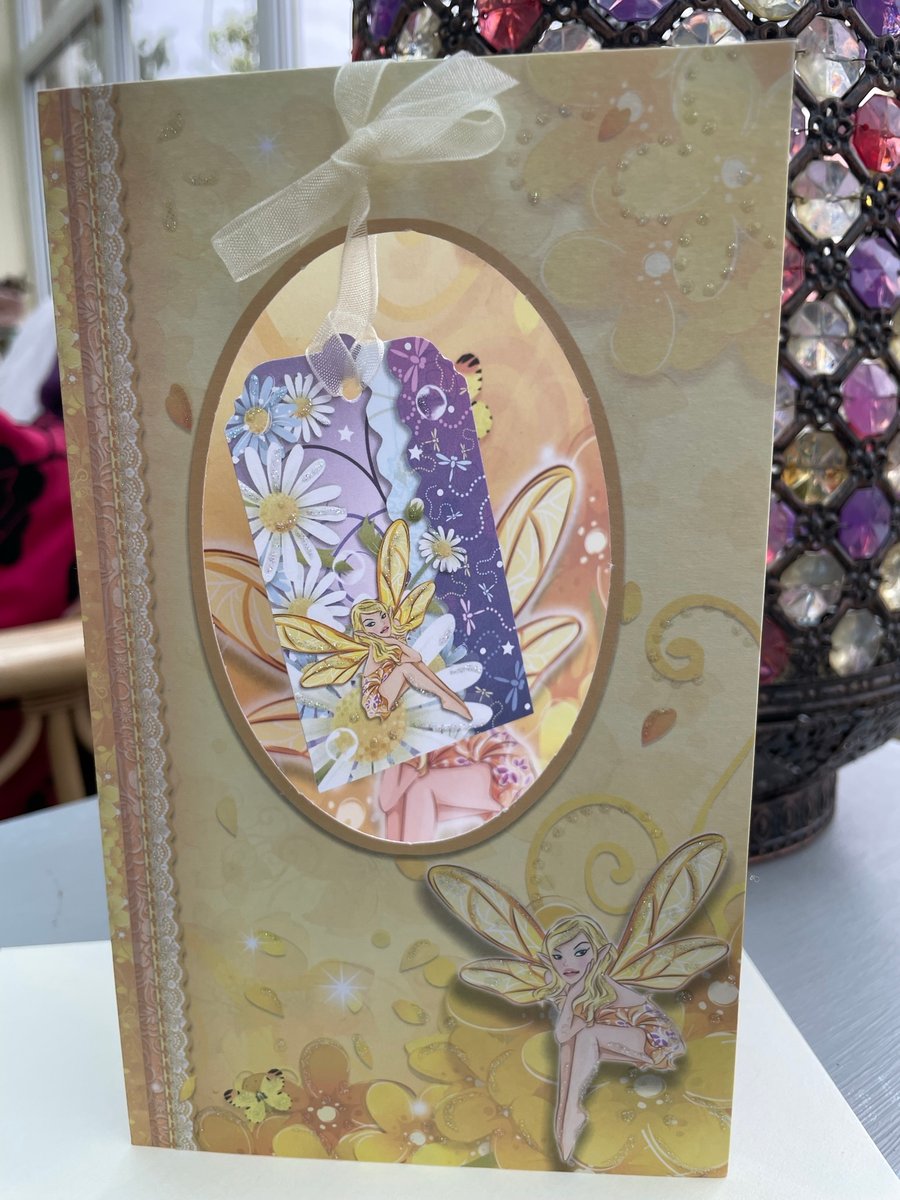 Daisy and fairy apature with love card