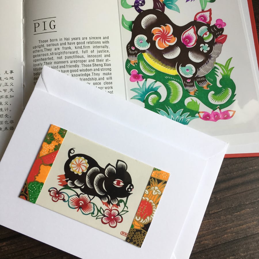 Handmade card. Chinese paper cut pig.