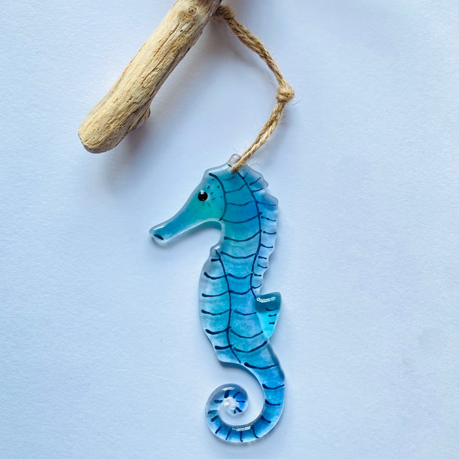 Blue seahorse decoration made of fused glass hanging sun catcher from driftwood 