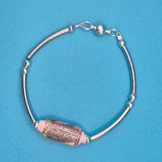 Delicate silver bracelet with sparkly paper bread