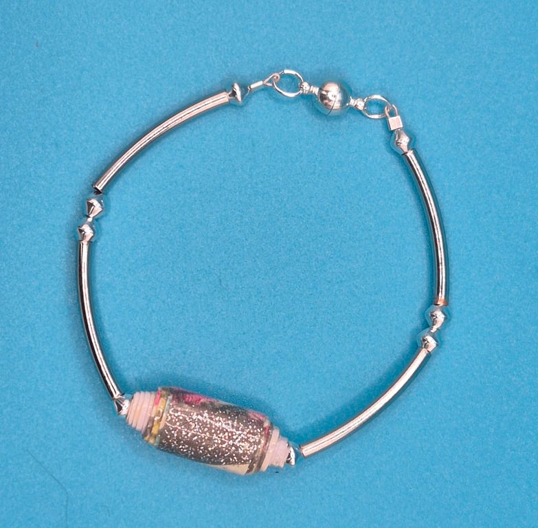Delicate silver bracelet with sparkly paper bread