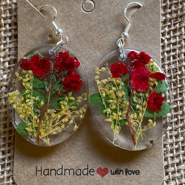 Pair of Handmade Oval Earrings With Real Dried Flowers In Red And Yellow.