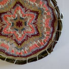 Multicoloured mandala in willow hoop