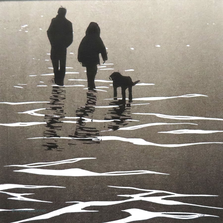 Original lino winter walkies on the wet sandy beach