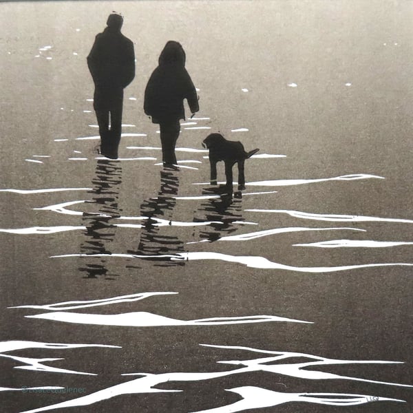 Original lino winter walkies on the wet sandy beach