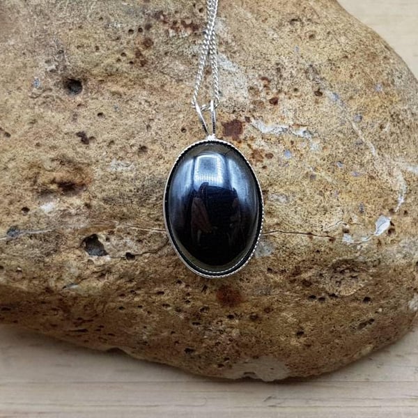 Simple oval Hematite pendant. Reiki jewellery. 18x13mm