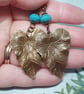 Bohemian brass leaf earrings with aqua blue Czech glass beads - Image 5