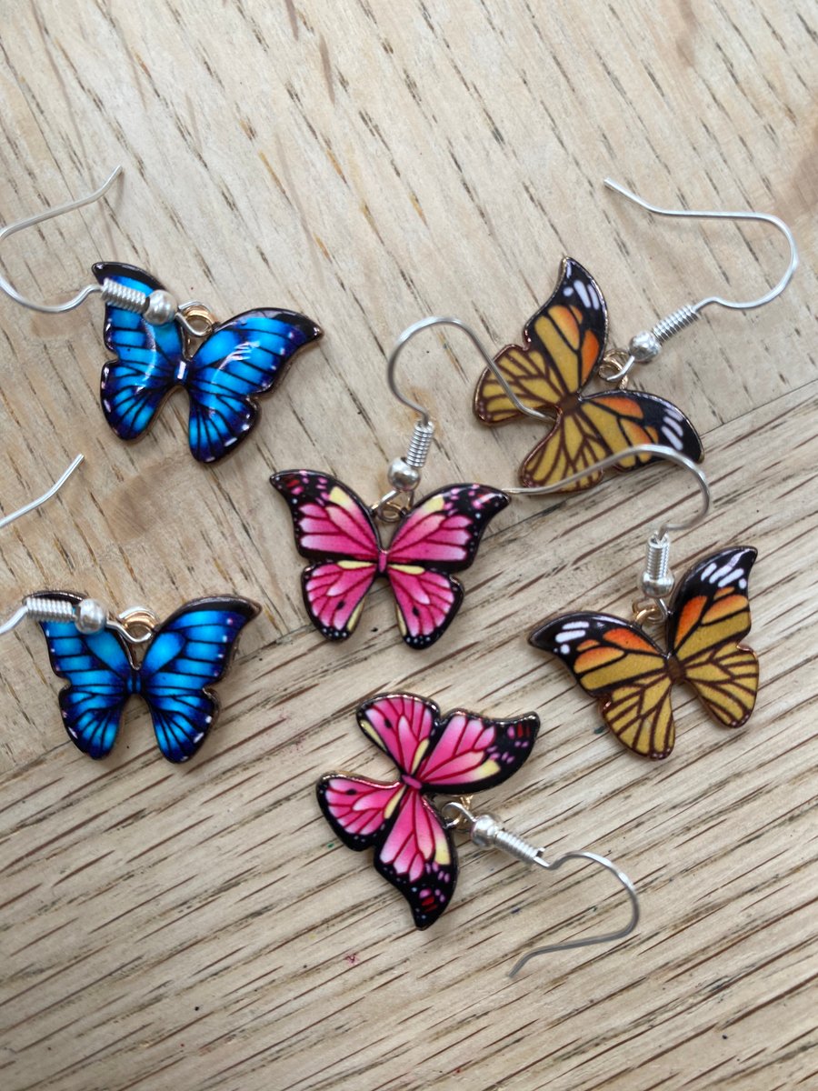 3 pairs of colourful butterfly dangly earrings