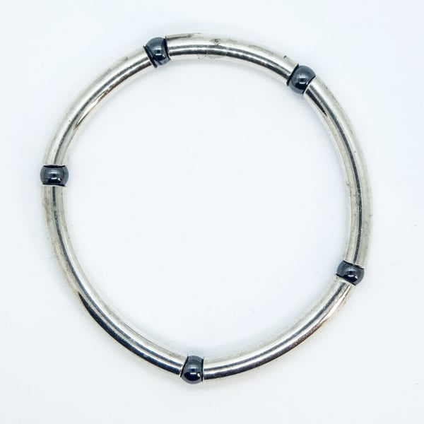 Stylish Silver Tube Bangle with Hematite Beads