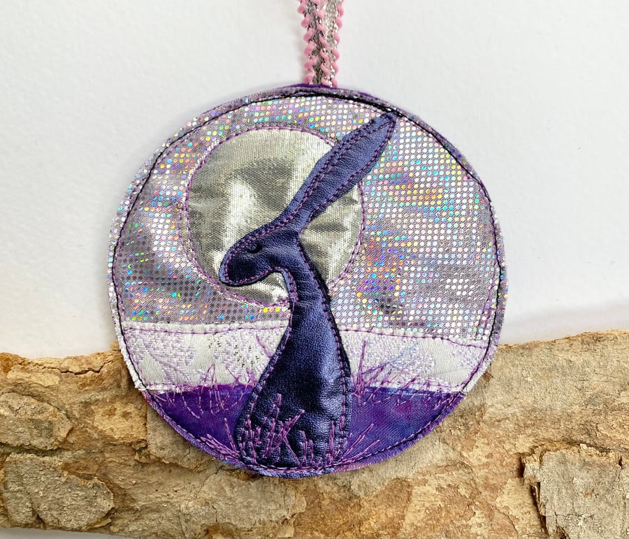 Upcycled embroidered moonlight hare home decoration. 