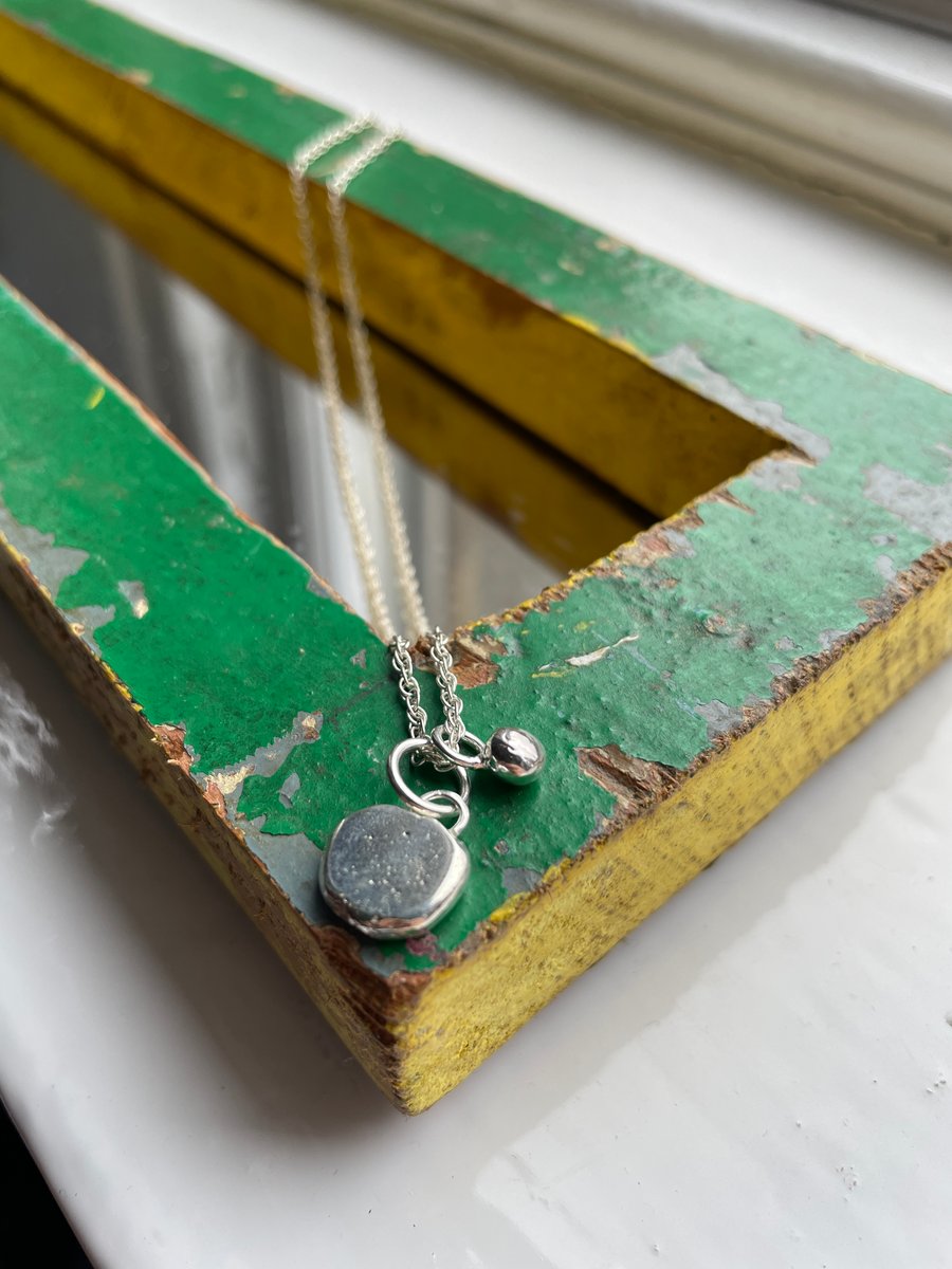 Small Sterling silver charm pendant on a silver chain, ball detail Handmade