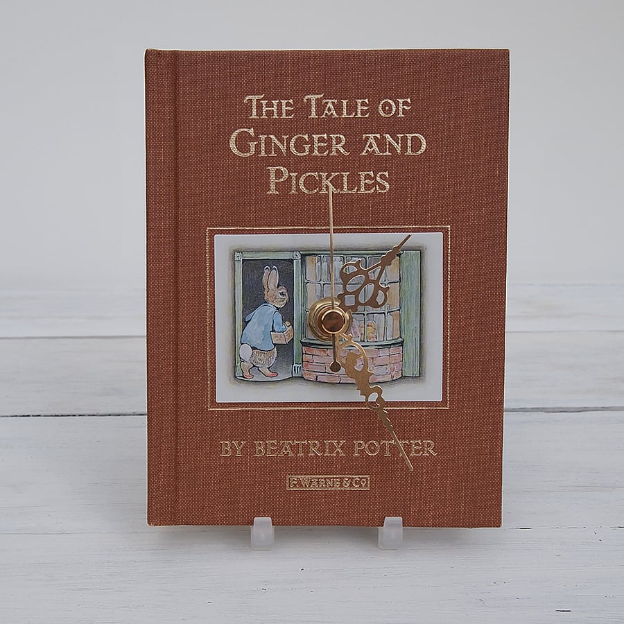 The Tale of Ginger & Pickles by Beatrix Potter book clock.  