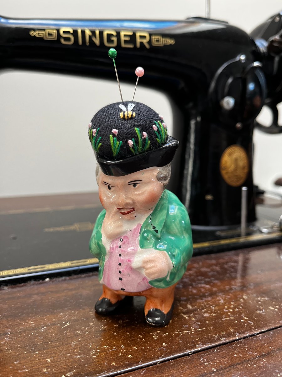 Pin cushion in repurposed vintage Toby jug embroidered flowers and bee