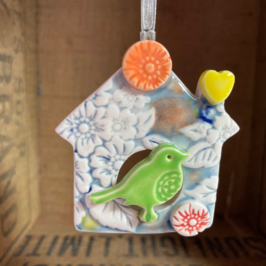 Small Ceramic bird house decoration with yellow heart