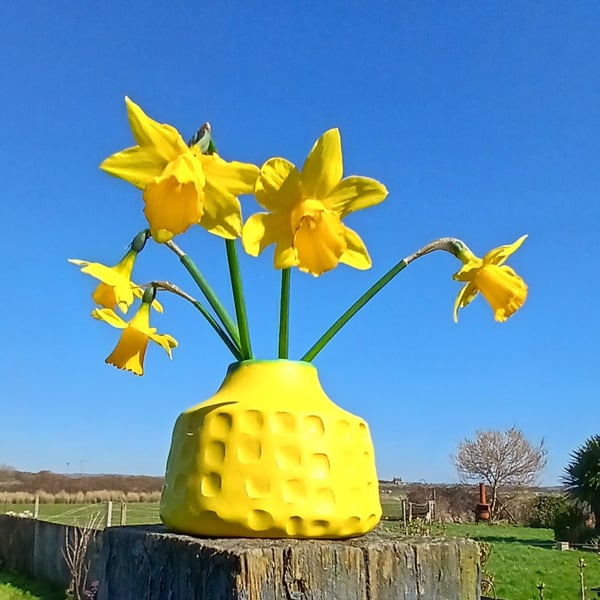 Small bright yellow bud vase 