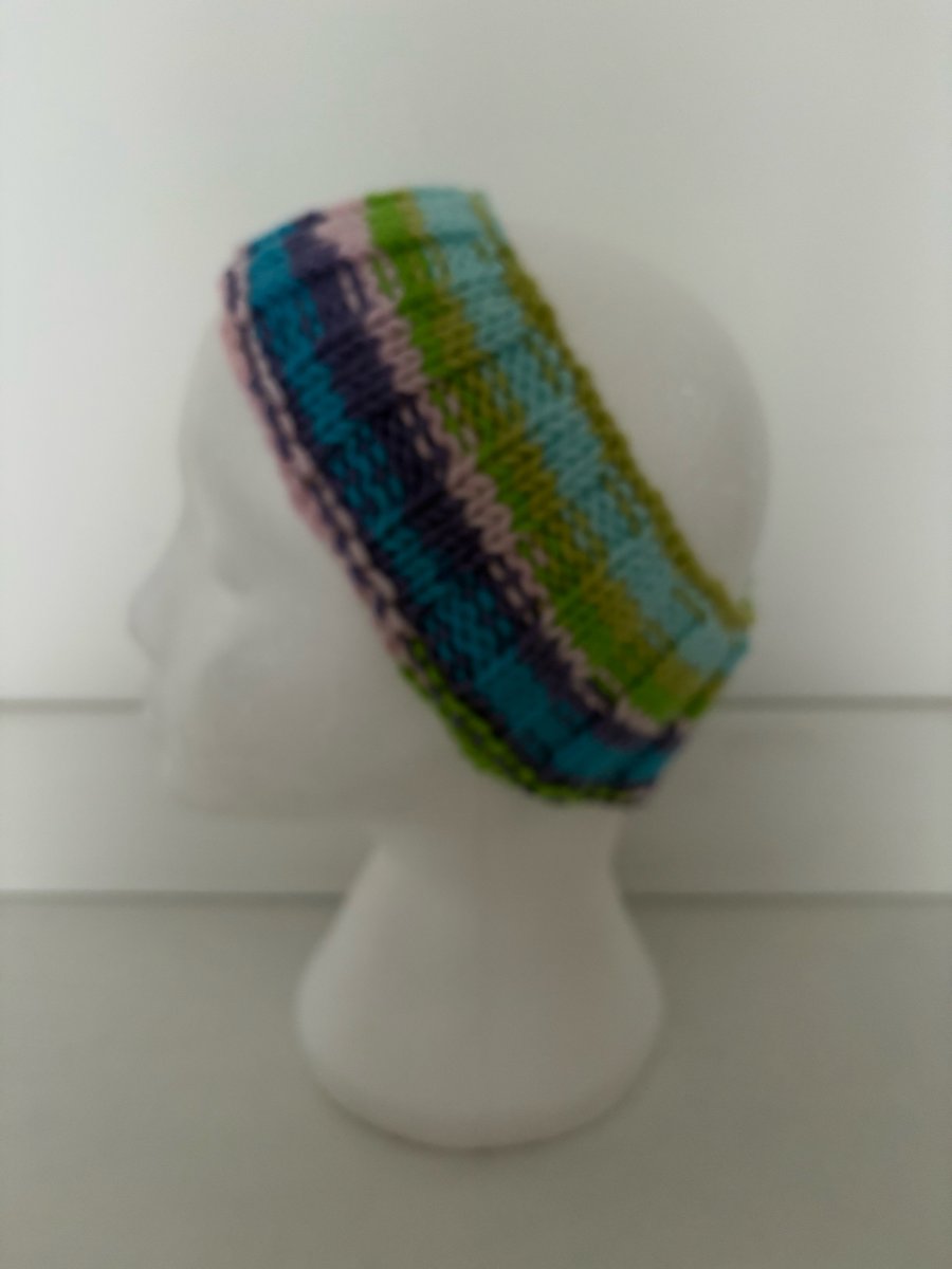 Hand knitted headband. 