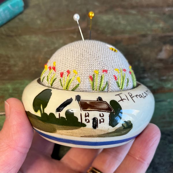 Pin cushion - Mottoware - who burnt the tablecloth - embroidered flowers and bee