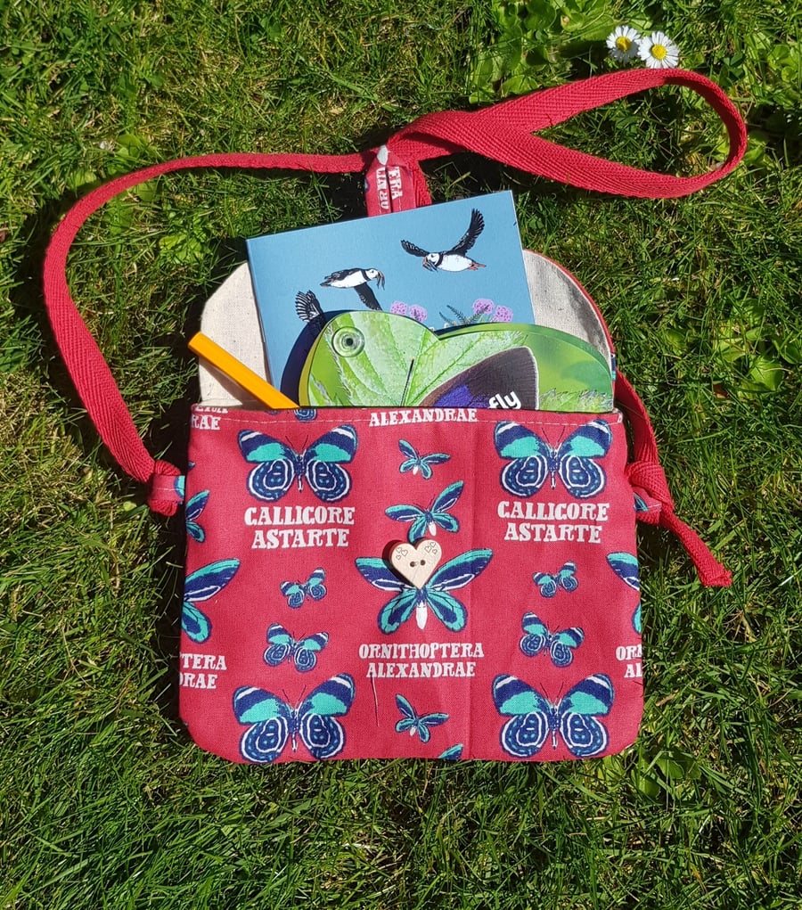 Gift for child: crossbody bag with butterfly ID swatch, notebook & pencil