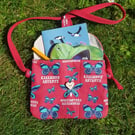 Gift for child: crossbody bag with butterfly ID swatch, notebook & pencil