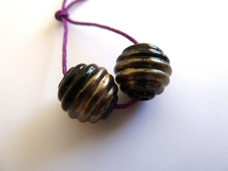 black and bronze lampwork glass bead pair