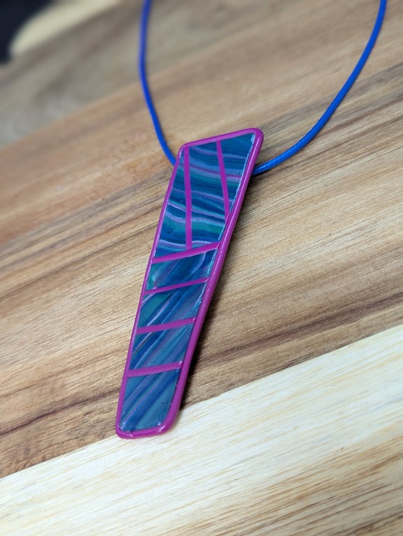 Vibrant polymer clay pendant, Blue waves of colour with pink detail.