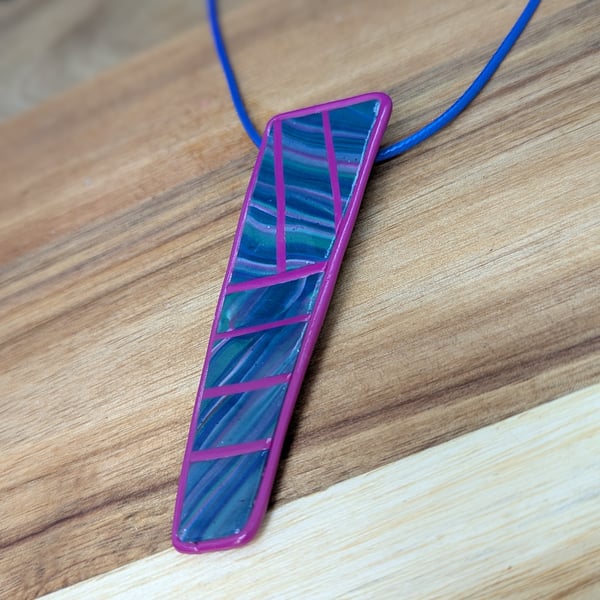 Vibrant polymer clay pendant, Blue waves of colour with pink detail.