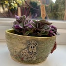 Plant pot decorated with sheep