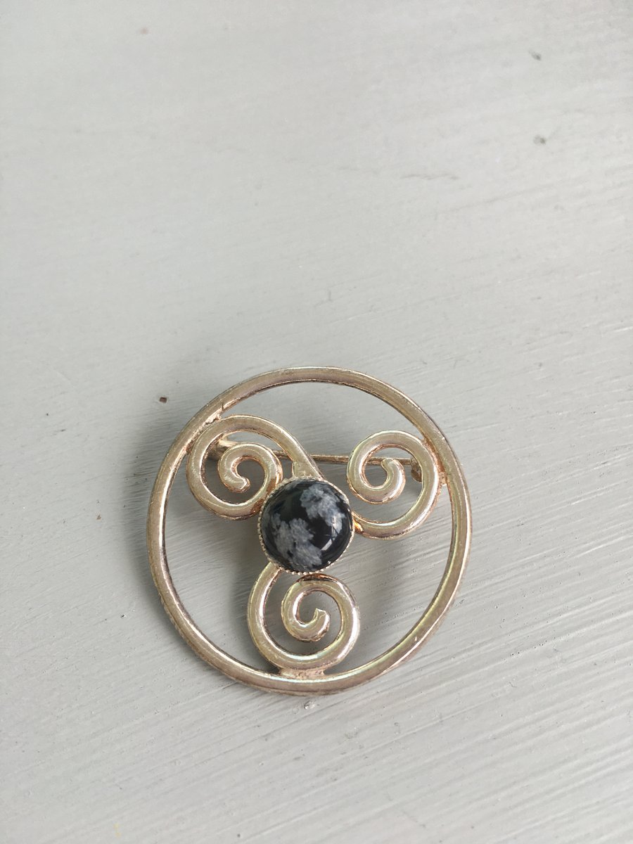 Celtic inspired sterling silver brooch with obsidian stone