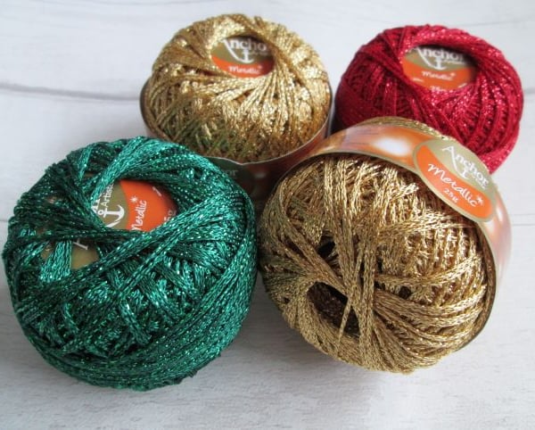 Four Balls of Anchor Artiste Metallic Crochet Yarn, Red, Green and Gold