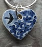 Handmade Ceramic Summer Garden Heart Pendant in blue - Image 1