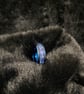 Titanium blue resin ring 