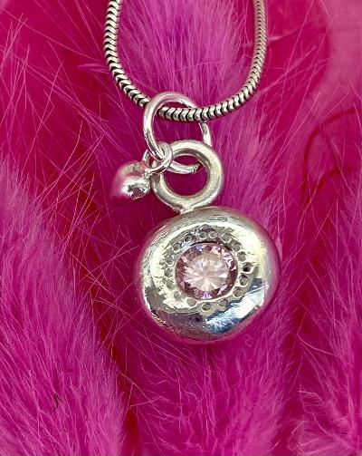 Solid silver cushion pendant necklace with pink gemstone