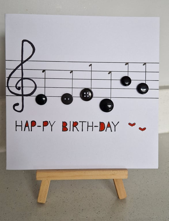 Hand drawn birthday card of music musical notes with buttons