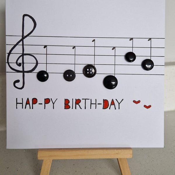 Hand drawn birthday card of music musical notes with buttons