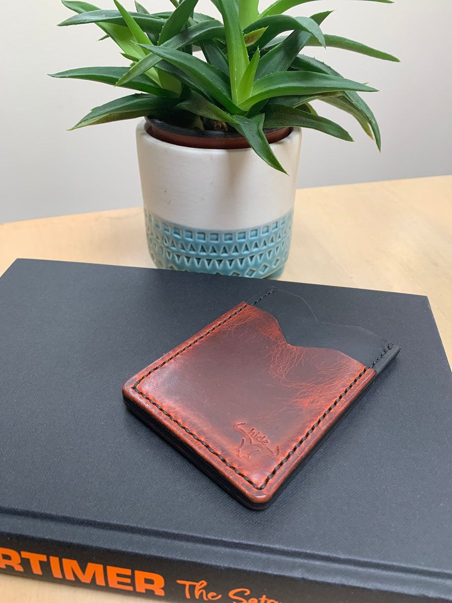 Leather card holder wallet in black and brown with 3 card slots