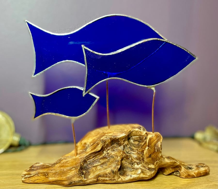 Stained glass blue fish on driftwood base sculpture
