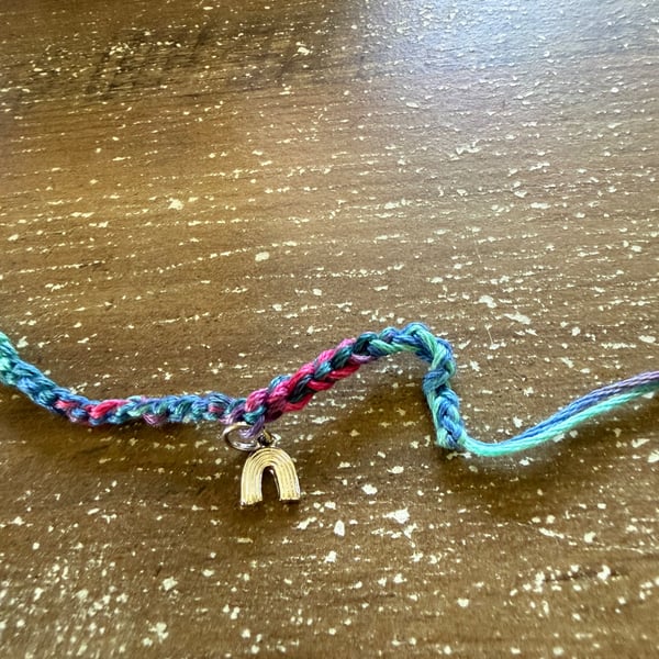 Multicolor Braided Friendship Bracelet with Gold Rainbow Charm