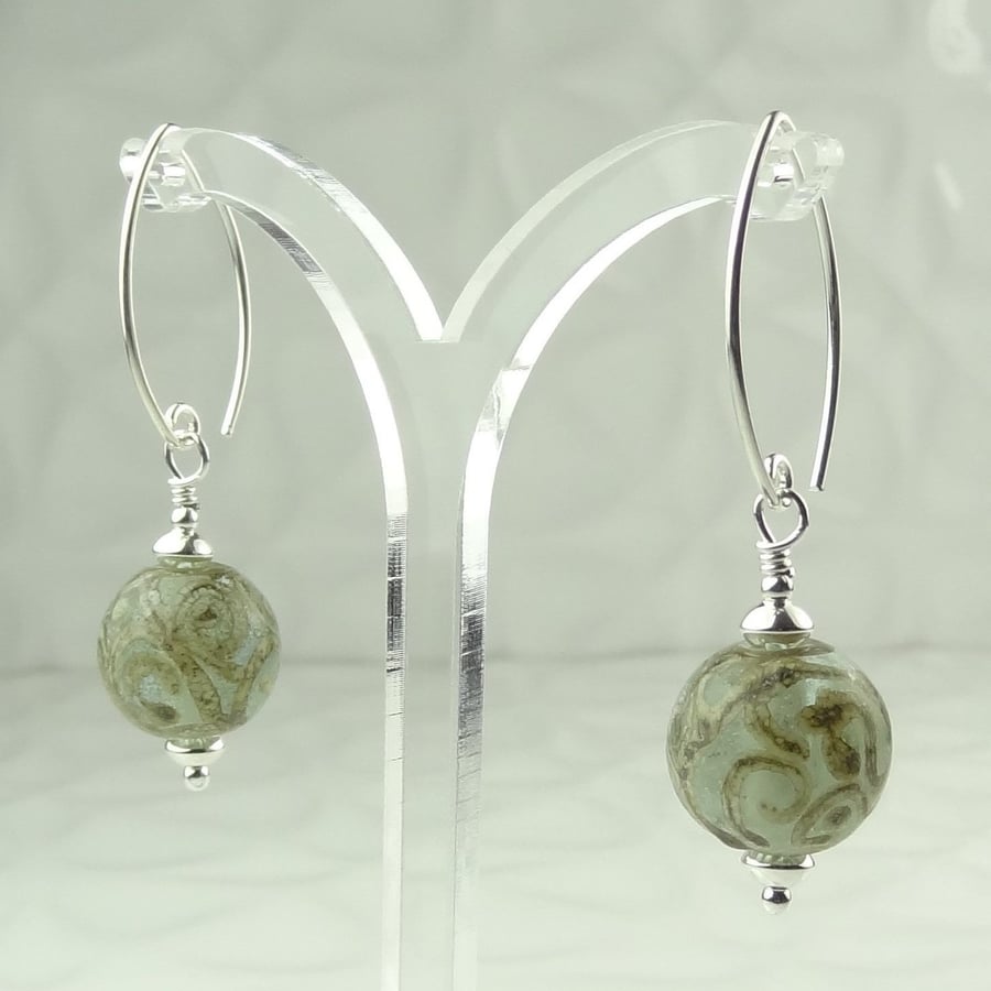 Pale green lampwork glass drop earrings, sterling silver, silvered ivory scrolls