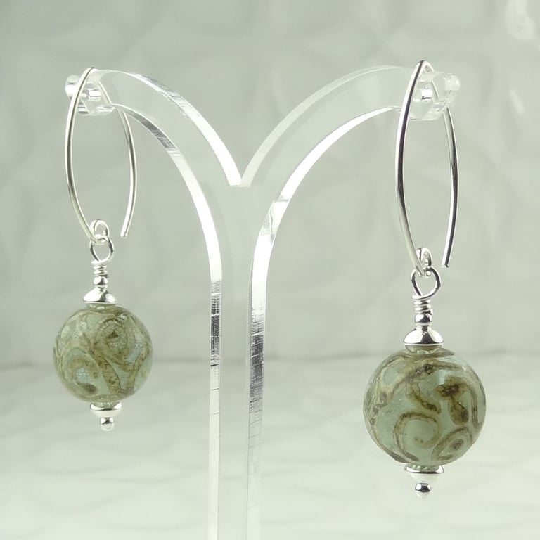 Pale green lampwork glass drop earrings, sterling silver, silvered ivory scrolls