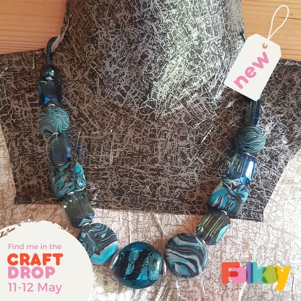  Distinctive necklace in turquoise, black and silver polymer clay