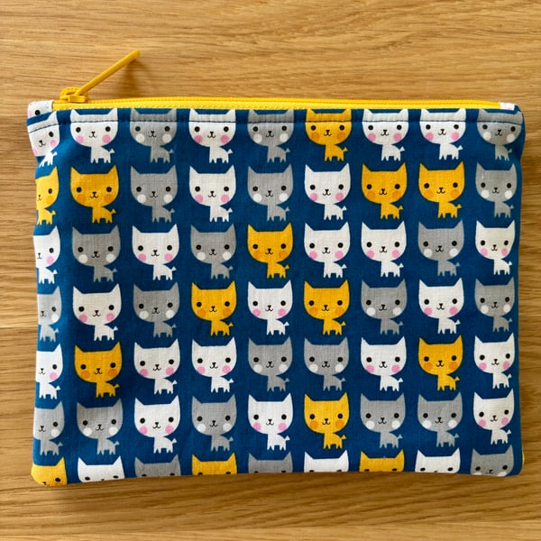 Zipped fabric pouch, purse, make up bag, in a blue, yellow and white cat print