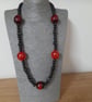 RED AND BLACK LONG BEADED NECKLACE. - Image 1