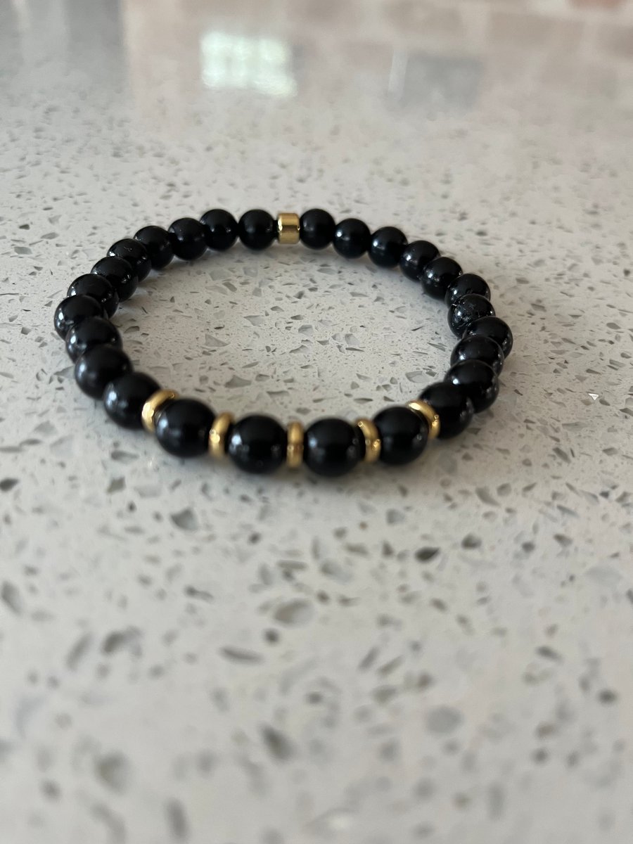 Black and gold faux pearl bracelet