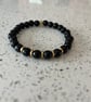 Black and gold faux pearl bracelet