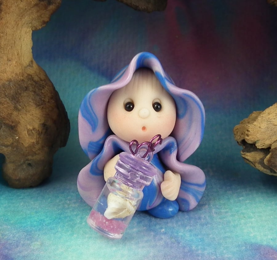 Tiny Beachcomber Gnome 'Zella' with shell in jar OOAK Sculpt by Ann Galvin