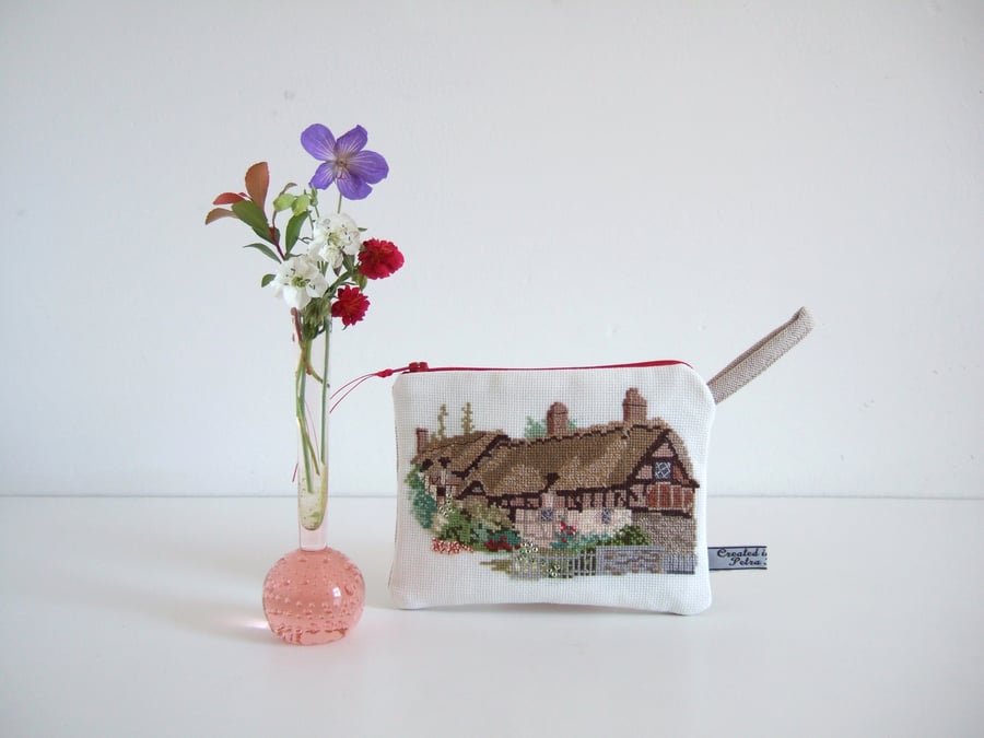  SOLD Make-up bag with vintage cross stitch thatched cottage and garden.