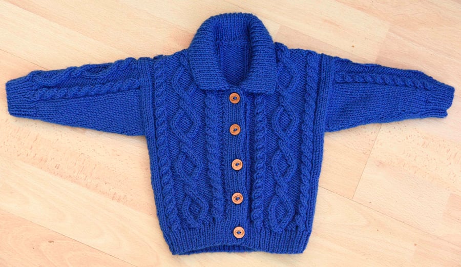 Blue Hand knitted aran style cardigan to fit chest 46cms 18inches age 6-12mths 