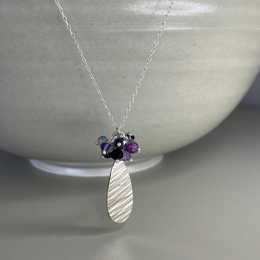 Sterling silver teardrop and mixed purple tone beaded cluster necklace 