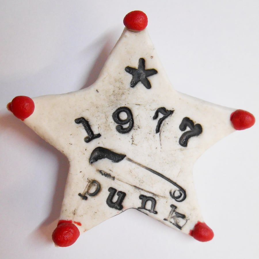 Buttons 1977 safety pin Punk Badges Star Design on white Porcelain.