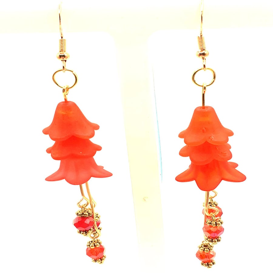 Radiant Blossoms: Lucite Flower and Glass Bead Earrings for Effortless Glamour